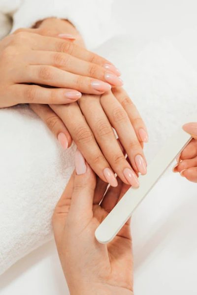 healthy-beautiful-manicure-manicurist-with-file_23-2148766563_Easy-Resize.com